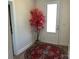 Welcoming foyer featuring a decorative tree and an eye-catching round rug near the front door at 106 Milliner Dr # 97, Troutman, NC 28166