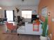 Living room with light-colored sofa and an accent wall at 106 Milliner Dr # 97, Troutman, NC 28166