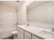 Bathroom featuring a double vanity, a large mirror, and a shower-tub combination at 1171 Blackburn Cir, Edgemoor, SC 29712