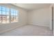 Neutral bedroom with a bright window, and a large sill for plants or decor at 1171 Blackburn Cir, Edgemoor, SC 29712