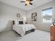 Bedroom with a queen bed, ceiling fan and neutral decor at 120 Trelawn St, Fort Mill, SC 29715