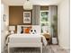 Modern bedroom with white bed frame, orange and black accents, and inspirational art at 13124 Hampton Bay Ln, Charlotte, NC 28262