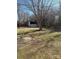 Backyard with shed, grass, and a concrete patio at 1638 Hudson Graham Ln, Charlotte, NC 28216