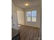 Spacious dining area with hardwood floors and large window at 1638 Hudson Graham Ln, Charlotte, NC 28216