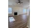 Living room with hardwood floors and a fireplace at 1638 Hudson Graham Ln, Charlotte, NC 28216