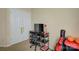 This bedroom has a black desk, chair, and a double door closet at 1687 Riverdale Dr, Rock Hill, SC 29732