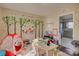 Cheerful playroom with a reading tent and colorful decor, adjacent to the kitchen for easy supervision at 1687 Riverdale Dr, Rock Hill, SC 29732