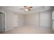 Bright bedroom with ceiling fan and ample closet space at 17629 Delmas Dr, Cornelius, NC 28031