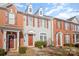 Brick front of townhome with gray accents and landscaping at 17629 Delmas Dr, Cornelius, NC 28031