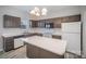 Modern kitchen featuring ample cabinetry and a breakfast bar at 17629 Delmas Dr, Cornelius, NC 28031