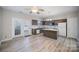 Eat-in kitchen with an island and plenty of cabinet space at 17629 Delmas Dr, Cornelius, NC 28031