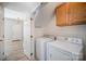 Convenient laundry area with washer, dryer and storage at 17629 Delmas Dr, Cornelius, NC 28031