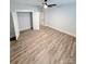 Bright bedroom featuring wood-look floors and a ceiling fan at 1945 Hendricks St, Rock Hill, SC 29732