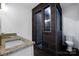 Bathroom with a walk-in shower and dark tile at 203 Bud Black Rd, Crouse, NC 28033