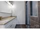 Modern bathroom with double vanity and large walk-in shower at 203 Bud Black Rd, Crouse, NC 28033