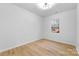 Bright bedroom with hardwood floors and window at 203 Bud Black Rd, Crouse, NC 28033