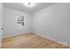 Bright bedroom with hardwood floors and a window at 203 Bud Black Rd, Crouse, NC 28033