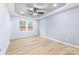 Bright bedroom with hardwood floors and two windows at 203 Bud Black Rd, Crouse, NC 28033