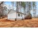 Side view of house with deck and landscaping at 203 Bud Black Rd, Crouse, NC 28033