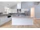 Modern kitchen with granite countertops, stainless steel appliances, and white cabinetry at 203 Bud Black Rd, Crouse, NC 28033