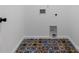 Laundry room with patterned tile floor and hookups for washer and dryer at 203 Bud Black Rd, Crouse, NC 28033