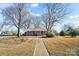 Brick ranch home with walkway, mature trees, and a well-maintained lawn at 2203 O'Hara Dr, Charlotte, NC 28273