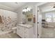 Elegant bathroom, granite vanity, and a shower/tub combo at 2358 Morton St, Charlotte, NC 28208