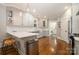 Modern kitchen with white cabinets and a large island at 2358 Morton St, Charlotte, NC 28208