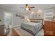 Spacious main bedroom with hardwood floors and ceiling fan at 2358 Morton St, Charlotte, NC 28208