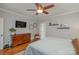 Main bedroom with hardwood floors and ensuite bathroom at 2358 Morton St, Charlotte, NC 28208