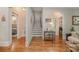 Grand staircase with hardwood floors and open concept at 2358 Morton St, Charlotte, NC 28208