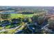 Aerial view of house in a residential neighborhood with lush green space at 241 Pinecrest Ct, Taylorsville, NC 28681