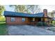 A cozy brown wood siding home with a covered porch at 241 Pinecrest Ct, Taylorsville, NC 28681