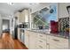 Well-equipped kitchen boasts granite counters and stainless steel appliances at 241 Pinecrest Ct, Taylorsville, NC 28681