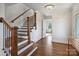 Bright entryway with a staircase, hardwood floors and access to other rooms at 2625 Croydon Rd, Charlotte, NC 28209