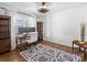 Home office with hardwood floors and built-in shelving at 2625 Croydon Rd, Charlotte, NC 28209