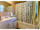 Clean bathroom with a tub shower and vanity at 2648 Roslyn Ave, Charlotte, NC 28208