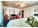 Cozy bedroom with a double bed, dresser, and ceiling fan at 2648 Roslyn Ave, Charlotte, NC 28208