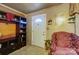 Bright entryway with a traditional white door and wood floors at 2648 Roslyn Ave, Charlotte, NC 28208