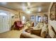 Living room with two armchairs, sofa, and a coffee table at 2648 Roslyn Ave, Charlotte, NC 28208