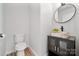 Modern bathroom with a vessel sink and dark vanity at 311 Drury Dr, Charlotte, NC 28206