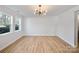 Bright living room with hardwood floors and lots of natural light at 311 Drury Dr, Charlotte, NC 28206