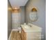 Simple bathroom with shower/tub combo and updated vanity at 31934 Ameron Cir, Albemarle, NC 28001