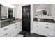 Bathroom with double vanity, concrete sink, and large mirror at 31934 Ameron Cir, Albemarle, NC 28001