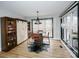 Charming dining area with a rustic barrel table and built-in shelving at 31934 Ameron Cir, Albemarle, NC 28001