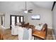 Relaxing living room with vaulted ceilings, a ceiling fan, and comfortable seating at 31934 Ameron Cir, Albemarle, NC 28001