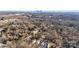 Aerial view of houses and surrounding landscape at 3220 Capitol Dr, Charlotte, NC 28208