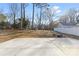 Large backyard with a concrete patio at 3220 Capitol Dr, Charlotte, NC 28208