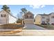 Two-story house with attached garage and driveway at 3220 Capitol Dr, Charlotte, NC 28208