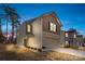 Two-story house with attached garage at dusk at 3220 Capitol Dr, Charlotte, NC 28208